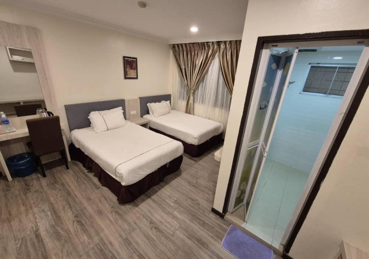 Angsoka Hotel Телук Интан Екстериор снимка